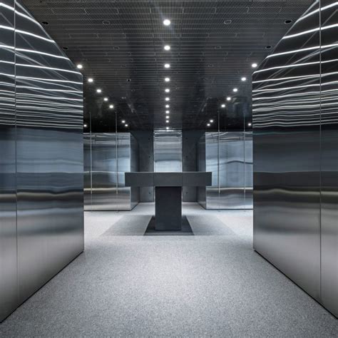david chipperfield designs metallic interiors for ssense s montreal store