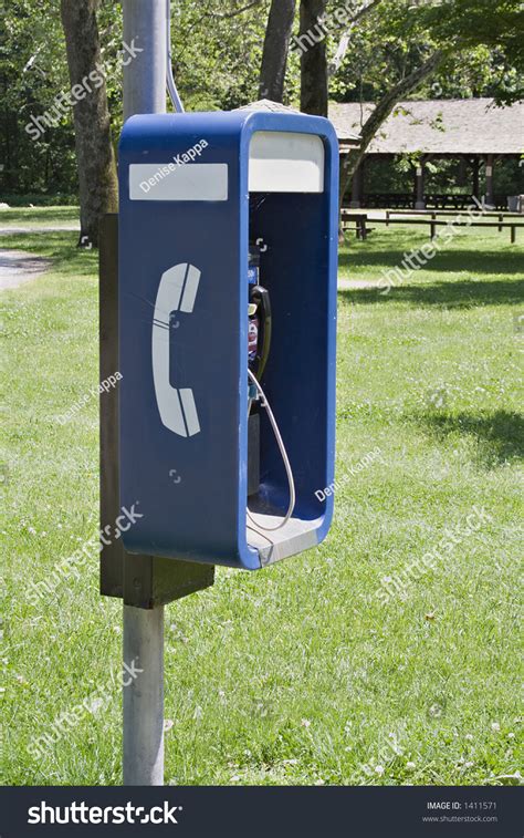outdoor telephone booth payphone   public park stock photo  shutterstock