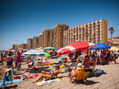 spanish beaches forced  close  turn  brit tourists  maintain social distancing