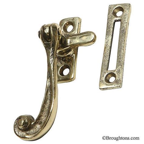 kirkpatrick scroll window handle  polished brass polished brass window fitting