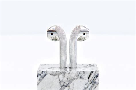 fancy  worth diamond encrusted airpods      marble stand