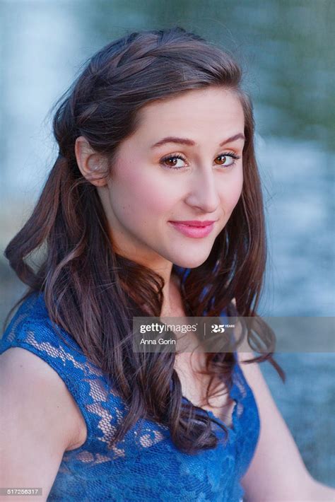 Brunette Teen Girl With Knowing Smile Headshot High Res