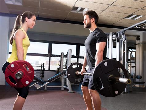 Barbell Man And Woman Workout At Fitness Gym Stock Image Image 40979609