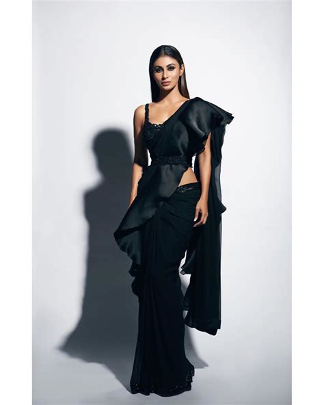 Mouni Roy Increases The Heat With Her Latest Black Sari