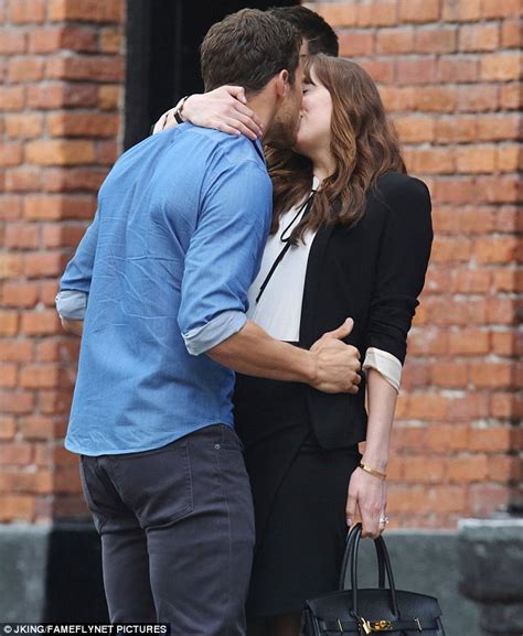 Jamie Dornan Plants A Kiss On Dakota Johnson As They Film Fifty Shades