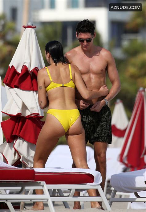 dua lipa sexy in yellow bikini as she takes dip in the ocean with her sister rina in miami aznude