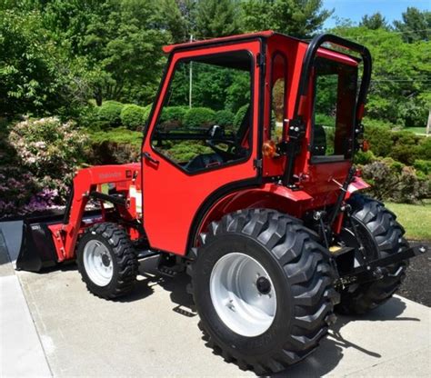 curtis industries introduces  steel cab   mahindra  compact tractor compact