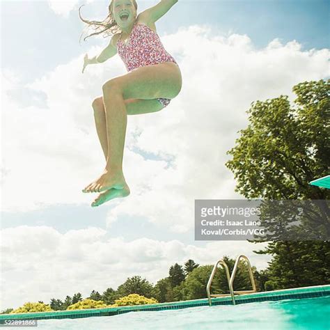 girl jumping off diving board photos et images de collection getty images