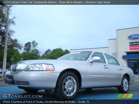 silver birch metallic  lincoln town car continental edition