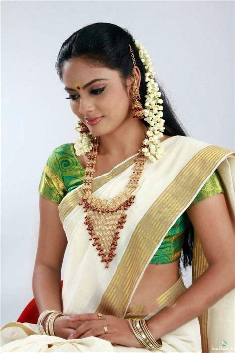 saree kerala kerala kasavu pure cotton saree   white spn confused  saree