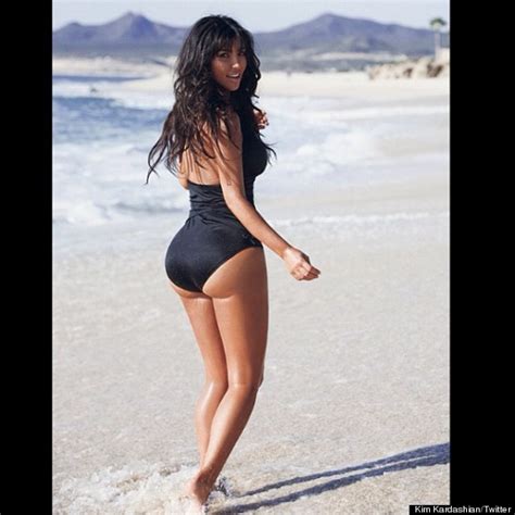 Kim Kardashian Flaunts Her Assets On The Beach Photo Huffpost