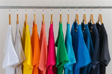 premium photo close   colorful  shirts  hangers apparel