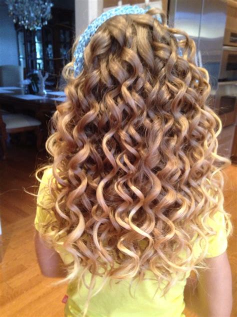 spiral curls done with small barrel curling wand spiral hair curls