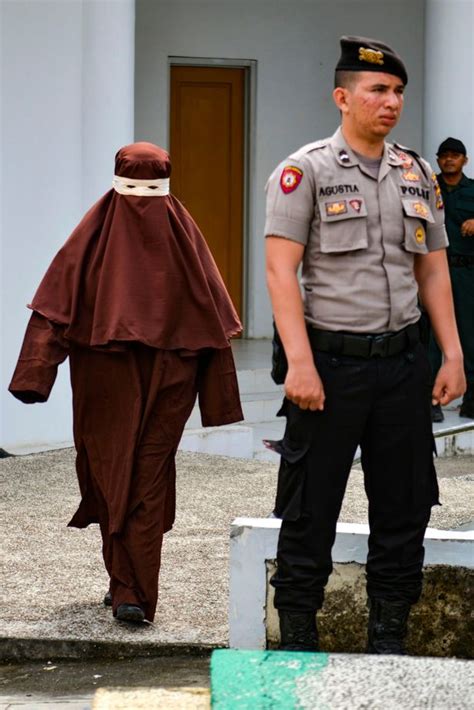 indonesia s first female flogging squad lashes criminal found with man in hotel world news