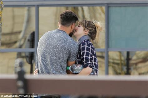 shailene woodley packs on the pda with ben volavola during bike ride