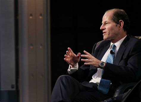 spitzer and slate face lawsuit over column on wall street the new