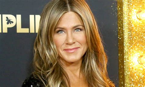 Jennifer Aniston Sizzles In Silky Plunging Jumpsuit In