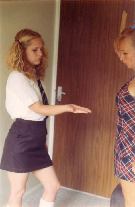 schoolgirls feel the sting on their palms tumbex