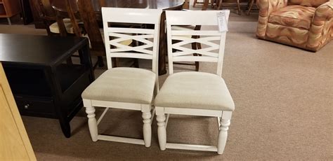 pair  cream dining chairs delmarva furniture consignment