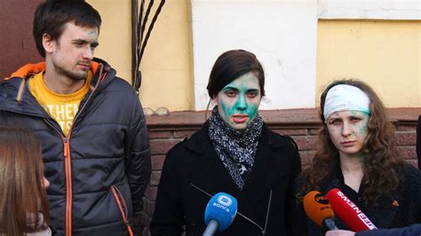 pussy riot members attacked sprayed with green antiseptic