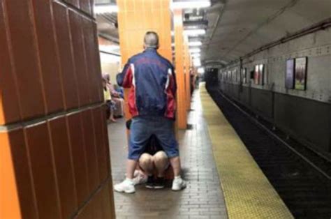 Irate Commuter Takes Photo Of Over Amorous Couple On Boston Subway