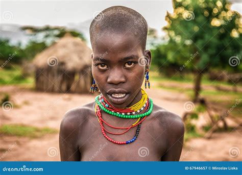 Portrait Of A Young African Woman In Her Village Editorial Photography