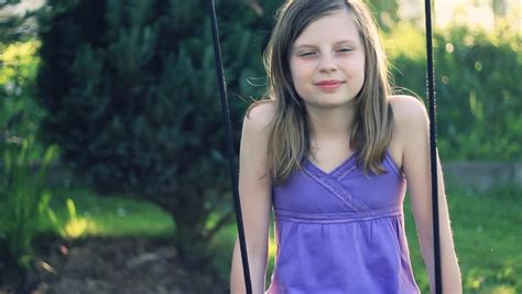 Preteen Girl Swinging Smiling Stock Footage Video 100 Royalty Free