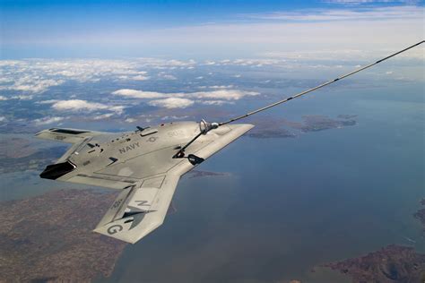 northrop grummans   unmanned aircraft refuels  flight