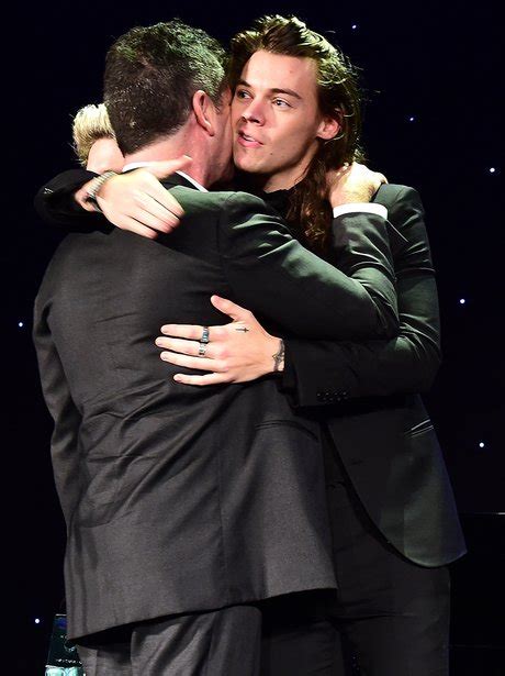 well this melted our hearts simon cowell and harry styles hug after 1d
