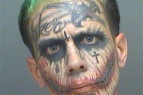 lawrence sullivan with face full of joker tattoos