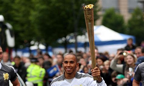 london 2012 olympics lewis hamilton carries torch daily