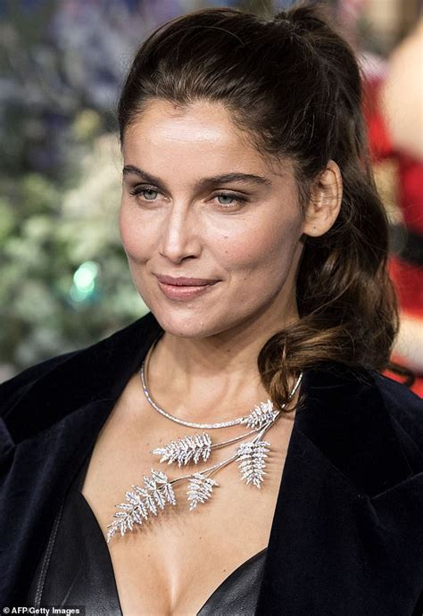 Laetitia Casta 40 Shows Off Her Cleavage In Her Thigh Split Pvc Dress