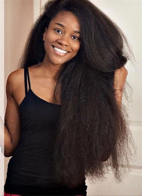 this is an african american woman who achieved natural long hair