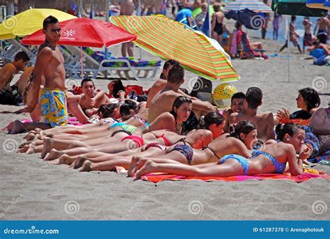 spanish people sunbathing fuengirola editorial stock photo image  sandy andalusia