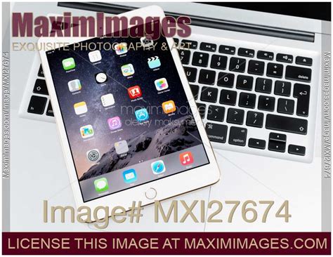 photo  apple ipad mini  tablet  laptop computer stock image mxi