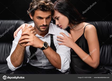 Sensual Woman Leaning Shoulder Elegant Man Leather Sofa Isolated Black