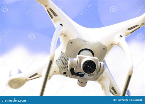 drone dji phantom   flight quadrocopter   blue sky editorial stock photo image