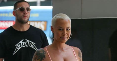 amber rose out and about in nyc and wearing a tight and cleavy dress