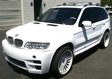 color change  bmw suv red  white custom vehicle wraps