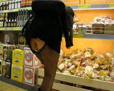grocery store upskirt with girl in boots