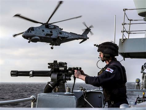 a royal navy sailor aboard hms st albans f83 mans a m134