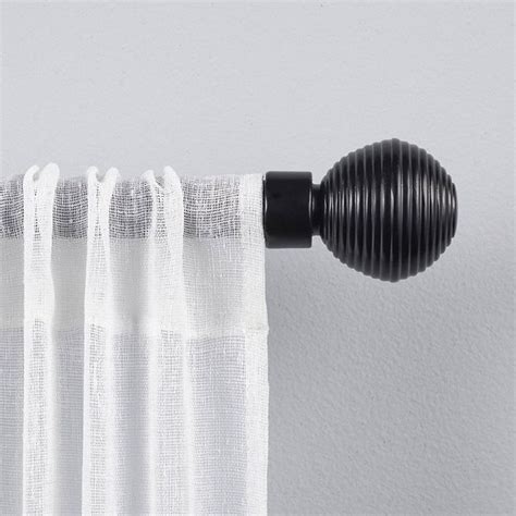 curtain  pulled     black rod      white background