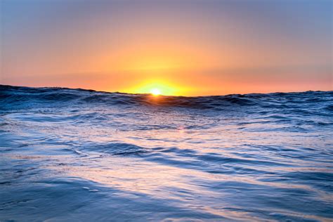 banco de imagens de praia mar costa agua oceano horizonte ceu dom nascer  sol por