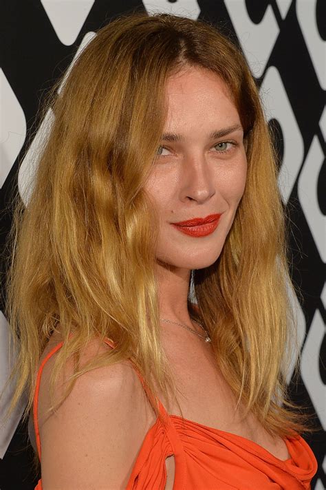 with her red lipstick and her messy yet chic bed head erin wasson