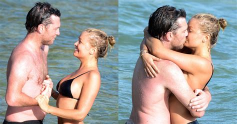 sam worthington and lara bingle kissing in the ocean popsugar celebrity