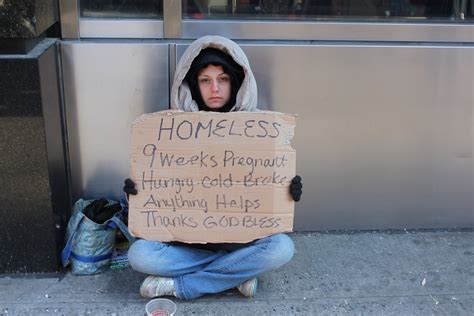 video man dresses up as a homeless person and gives 20 to those that help him