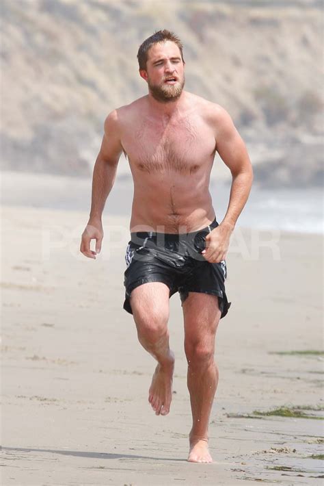 Shirtless Robert Pattinson Plays On The Beach — See Over 100 Pictures