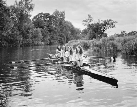 naked women row a boat along a river for the warwick rowers 2016