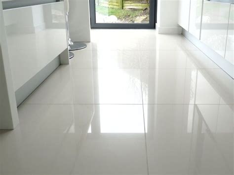 large white kitchen floor tiles we put shiny white tiles in our bathroom and they always look g