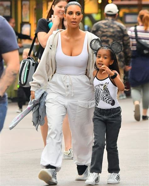 kim kardashian braless reality star reveals a little too much in tight top at disneyland